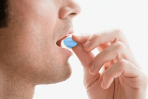 Man takes sildenafil tablet
